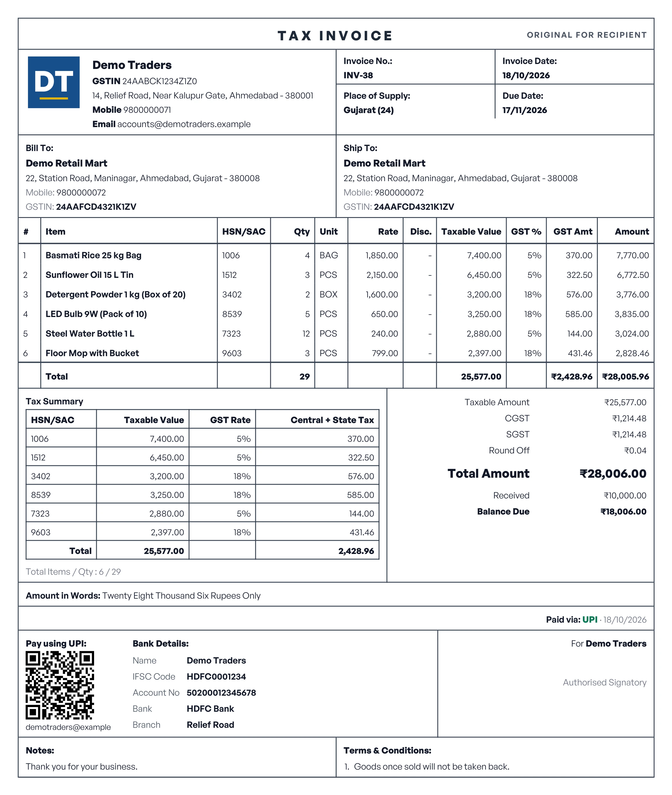 The same tax invoice in the Boxed design: every part in a ruled box, a tax summary by HSN code beside the totals, then the UPI QR code, bank details and signature in boxes